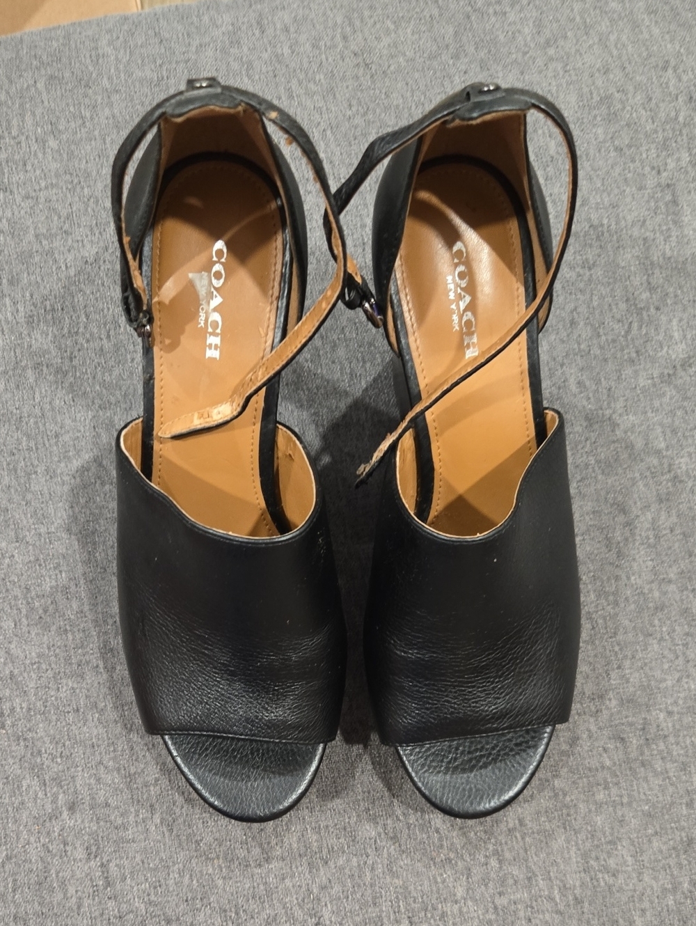 Coach Black Leather Wedge Sandals  **NEVER WORN** ONLY ONE FLAW. PLEASE SEE PICS